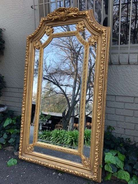 Ornately Carved and Gilded Bevelled Mirror