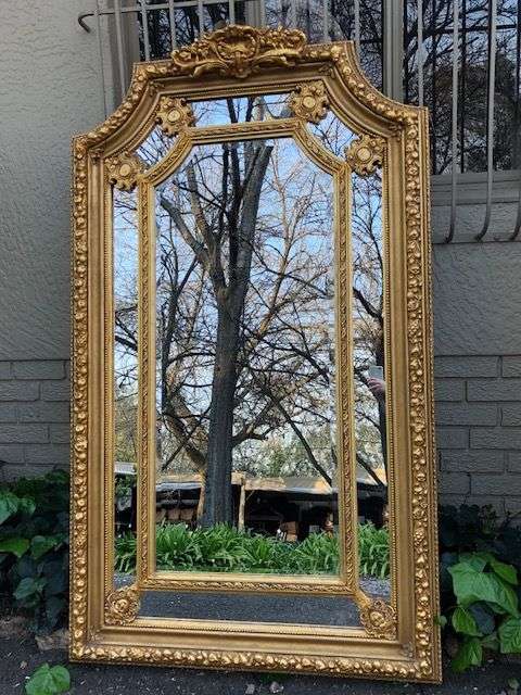 Ornately Carved and Gilded Bevelled Mirror