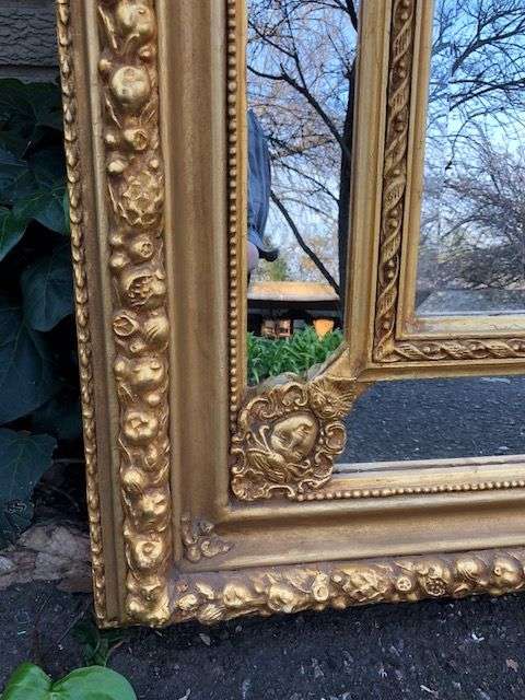 Ornately Carved and Gilded Bevelled Mirror