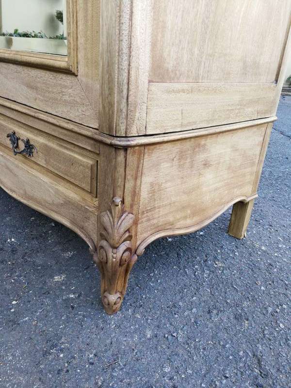 A 20th Century French Rococo Style Armoire with Bevelled Mirrors and Drawers finished in a contem...