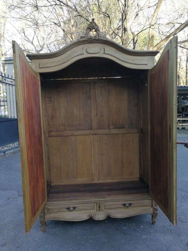 A 20th Century French Rococo Style Armoire with Bevelled Mirrors and Drawers finished in a contem...