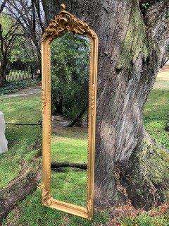 Ornately Carved and Gilded Bevelled Mirror