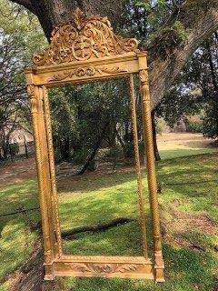 Ornately Carved and Gilded Bevelled Mirror