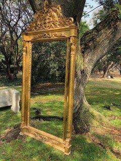 Ornately Carved and Gilded Bevelled Mirror