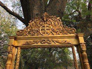 Ornately Carved and Gilded Bevelled Mirror