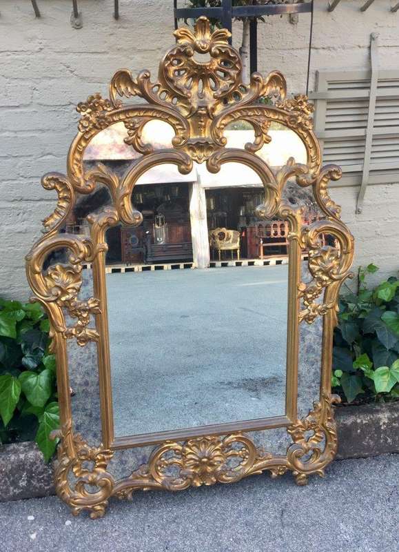 Gilded and Ornately Carved Wooden Mirror. Belgium. Circa 1974