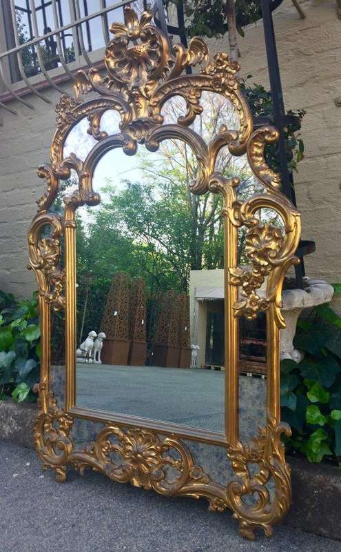Gilded and Ornately Carved Wooden Mirror. Belgium. Circa 1974