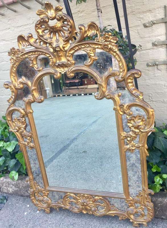 Gilded and Ornately Carved Wooden Mirror. Belgium. Circa 1974