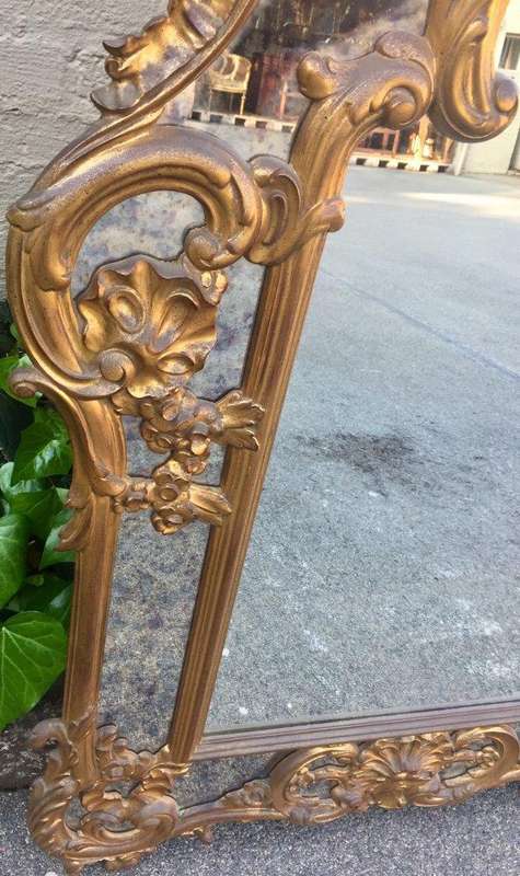 Gilded and Ornately Carved Wooden Mirror. Belgium. Circa 1974
