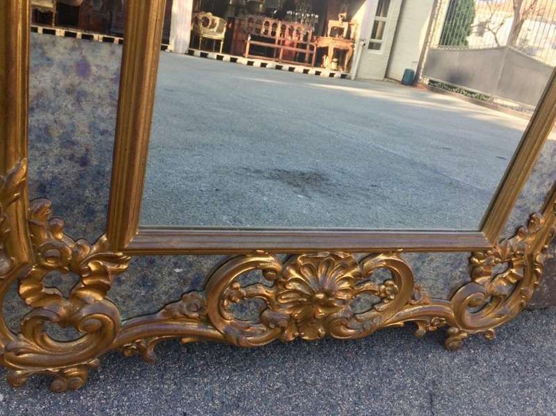 Gilded and Ornately Carved Wooden Mirror. Belgium. Circa 1974