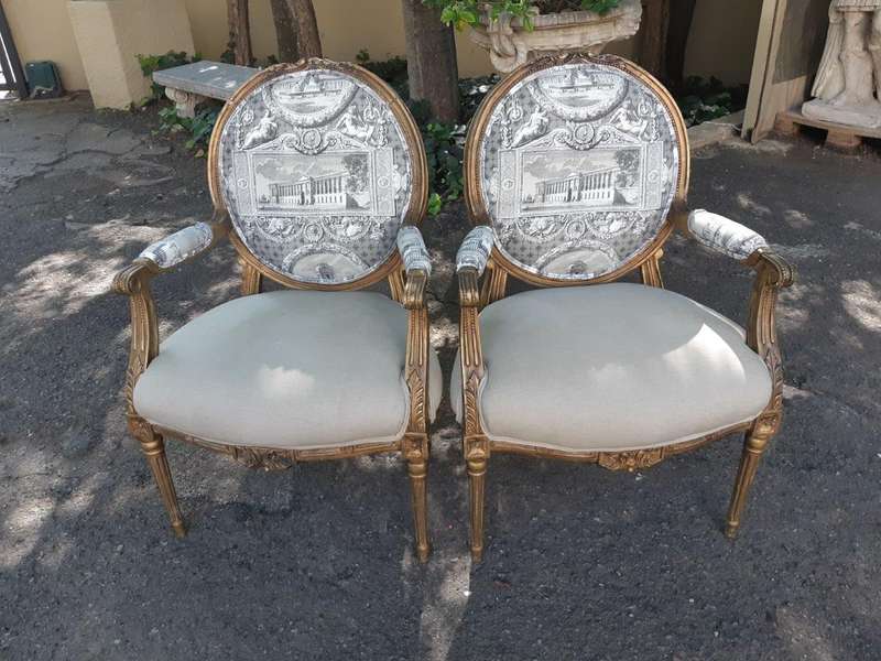 Pair Of French Style Carved Armchairs, Gilded And Upholstered In Imported Linen And Cotton Uphols...