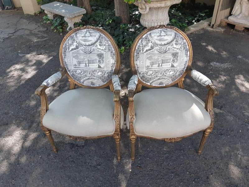 Pair Of French Style Carved Armchairs, Gilded And Upholstered In Imported Linen And Cotton Uphols...