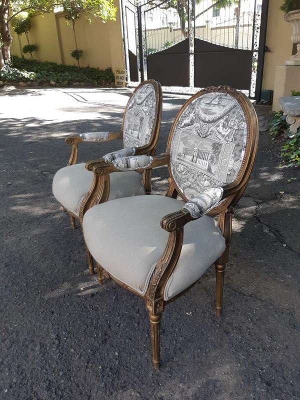Pair Of French Style Carved Armchairs, Gilded And Upholstered In Imported Linen And Cotton Uphols...