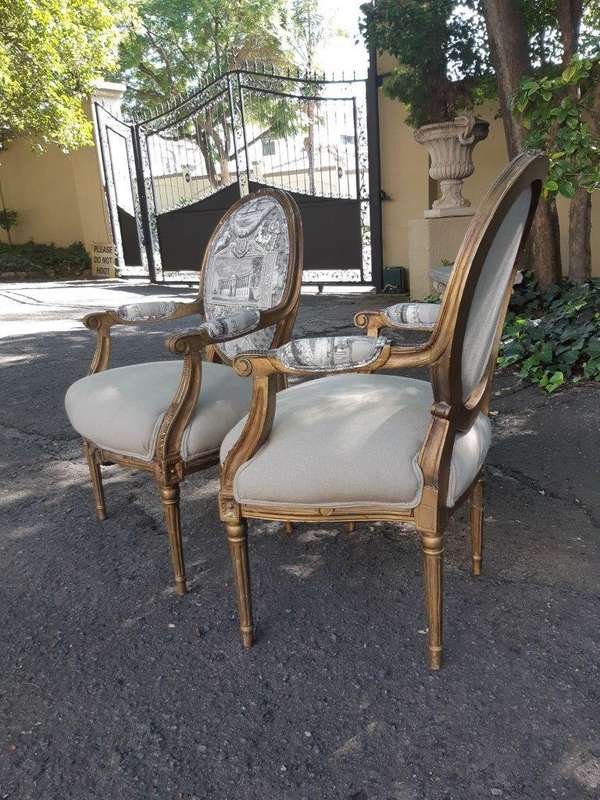 Pair Of French Style Carved Armchairs, Gilded And Upholstered In Imported Linen And Cotton Uphols...
