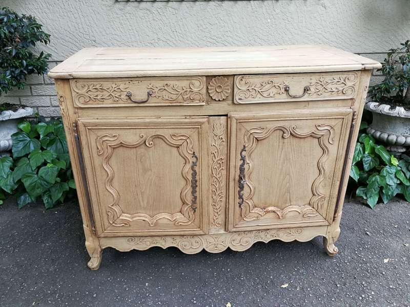 A Provincial Style French Oak Server in a Contemporary Bleached / Natural Wood Finish with Cream ...