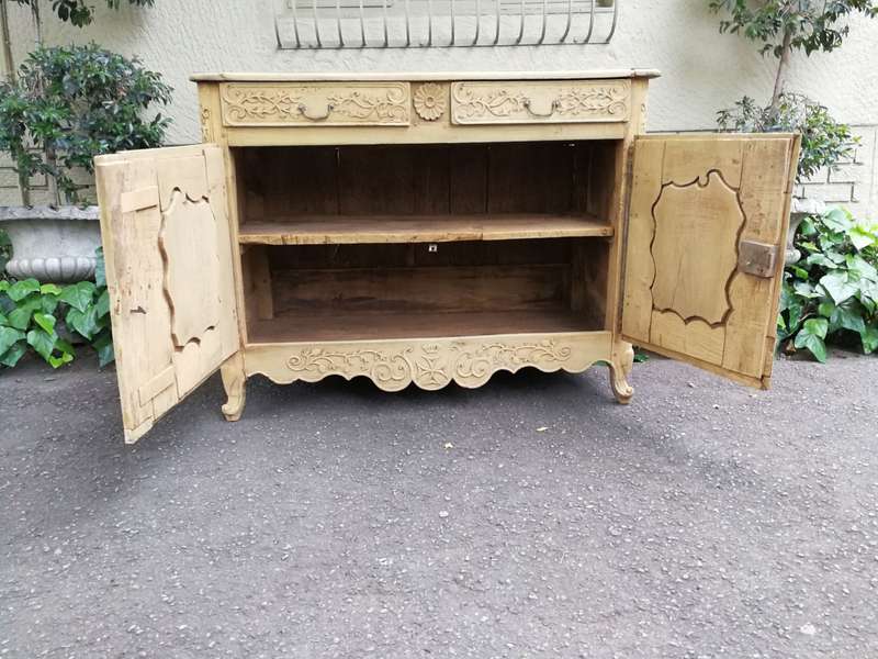 A Provincial Style French Oak Server in a Contemporary Bleached / Natural Wood Finish with Cream ...