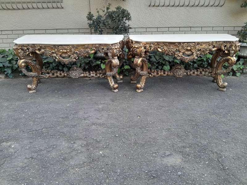 Pair Louis XVI style moulded and gilded Console / Hall Tables, with moulded serpentine fronted gr...