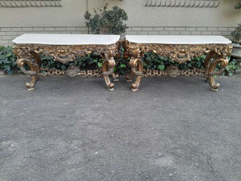 Pair Louis XVI style moulded and gilded Console / Hall Tables, with moulded serpentine fronted gr...
