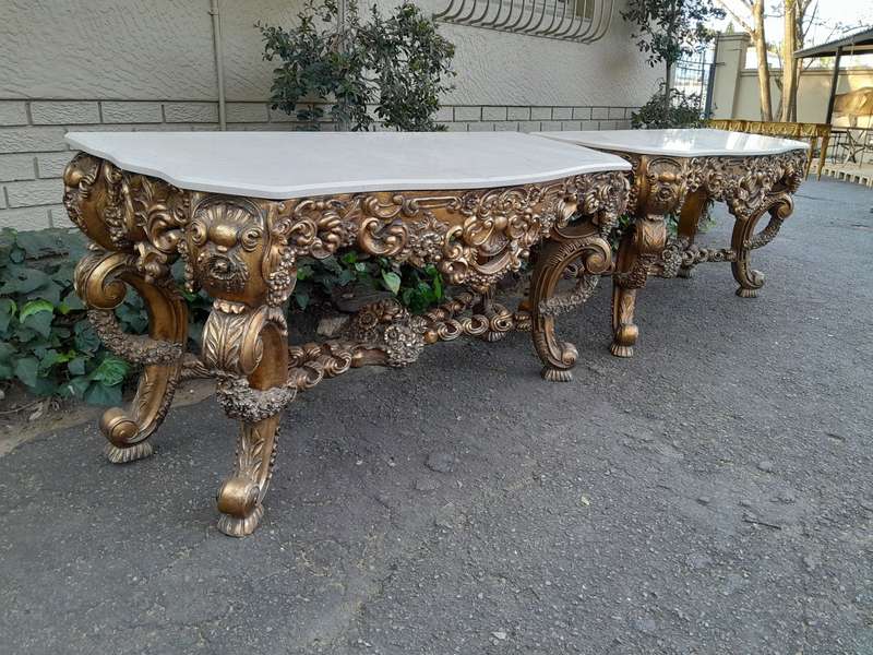 Pair Louis XVI style moulded and gilded Console / Hall Tables, with moulded serpentine fronted gr...