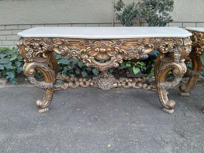 Pair Louis XVI style moulded and gilded Console / Hall Tables, with moulded serpentine fronted gr...