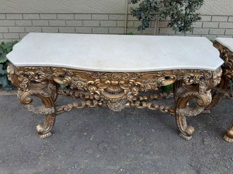 Pair Louis XVI style moulded and gilded Console / Hall Tables, with moulded serpentine fronted gr...