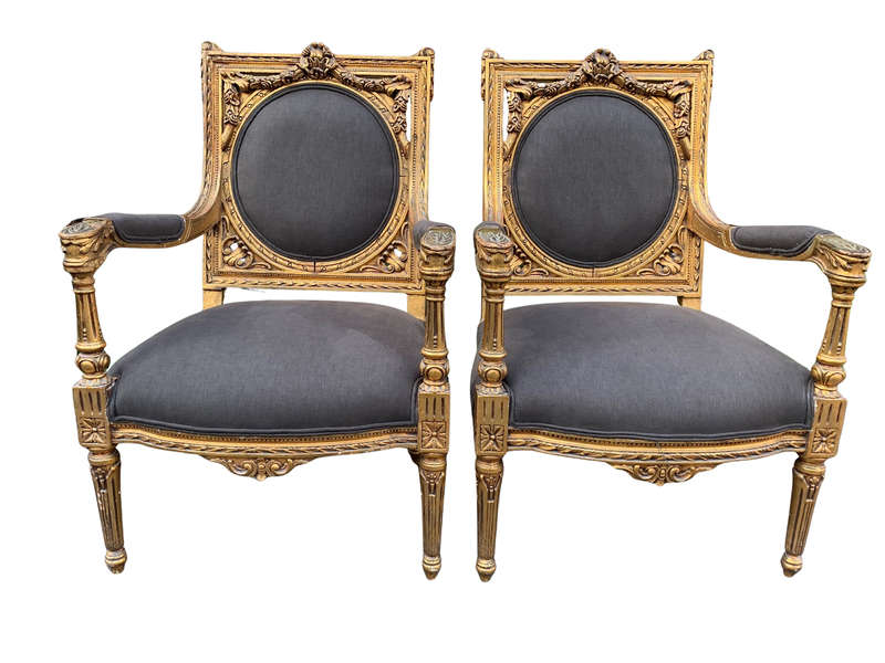 A 20th Century Pair (over 80 years old) of French Style Ornately Carved and Gilded Arm Chairs Uph...