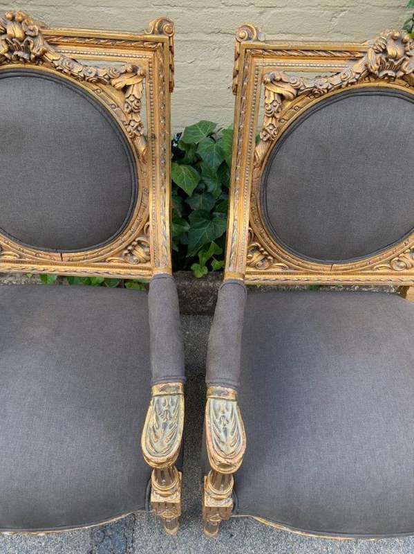 A 20th Century Pair (over 80 years old) of French Style Ornately Carved and Gilded Arm Chairs Uph...