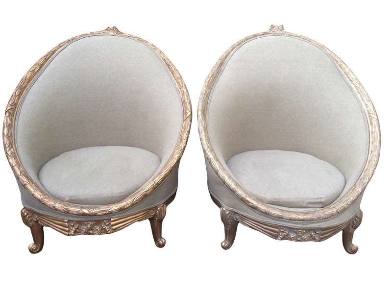 A Pair of French Empire Style Carved and Gilded Arm / Tub / Bergere Chairs Upholstered in an Impo...