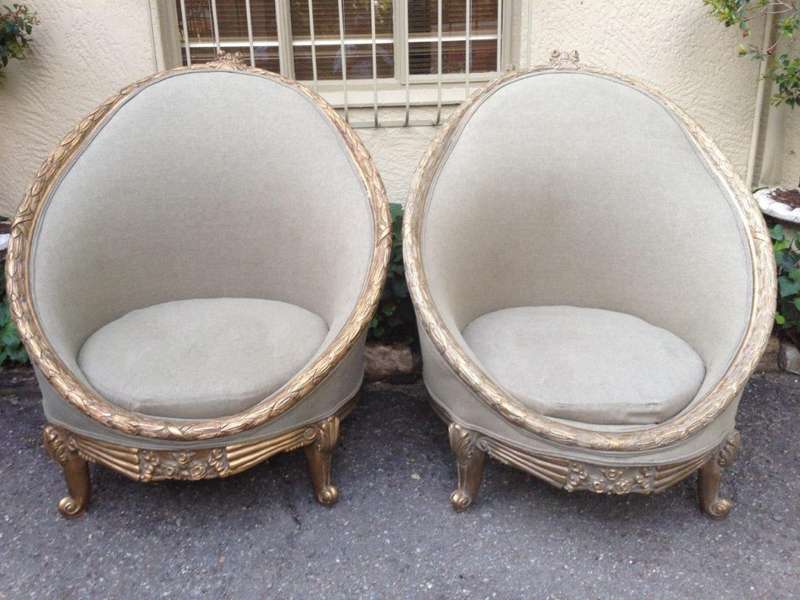 A Pair of French Empire Style Carved and Gilded Arm / Tub / Bergere Chairs Upholstered in an Impo...