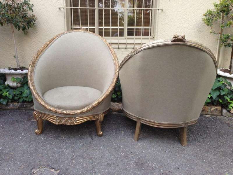 A Pair of French Empire Style Carved and Gilded Arm / Tub / Bergere Chairs Upholstered in an Impo...