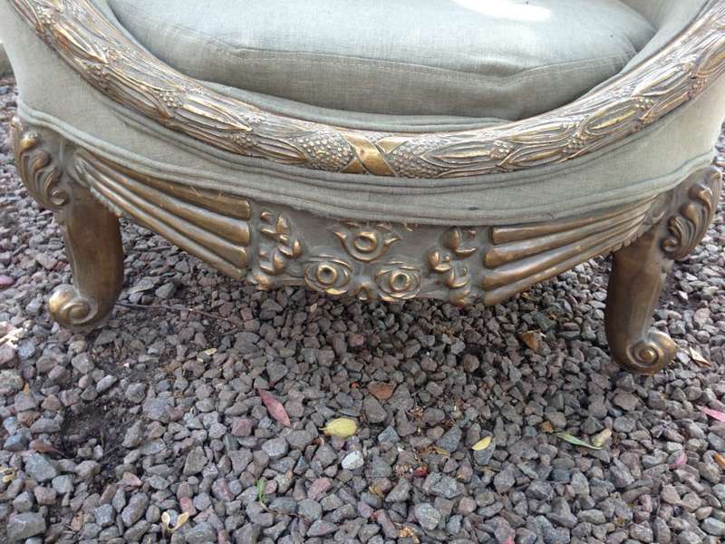 A Pair of French Empire Style Carved and Gilded Arm / Tub / Bergere Chairs Upholstered in an Impo...
