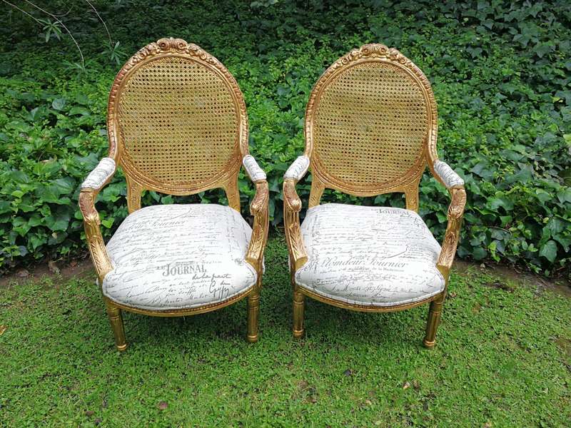 A Pair Of French Style Carved and Gilded Rattan Back Armchairs Upholstered in an Imported Fabric ...