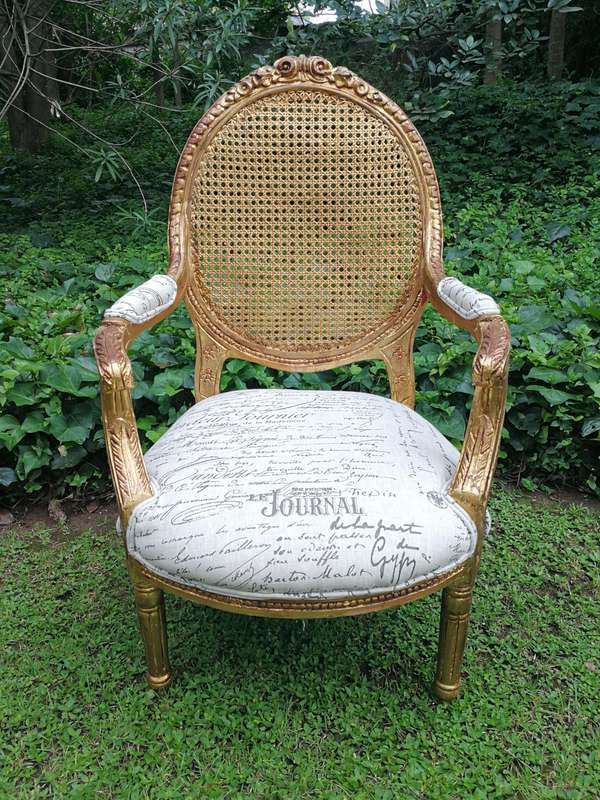 A Pair Of French Style Carved and Gilded Rattan Back Armchairs Upholstered in an Imported Fabric ...