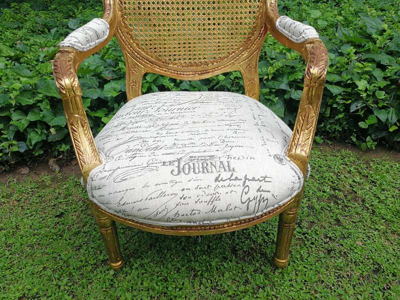 A Pair Of French Style Carved and Gilded Rattan Back Armchairs Upholstered in an Imported Fabric ...