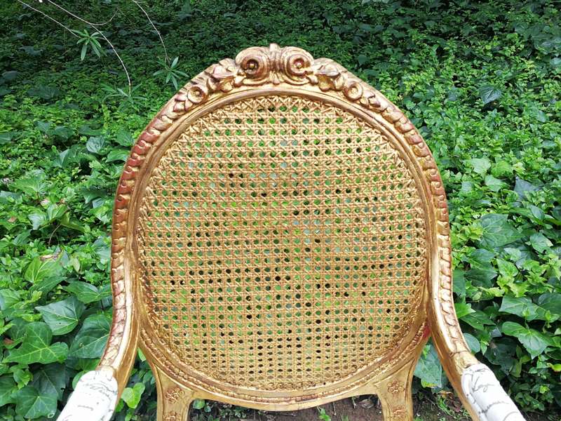 A Pair Of French Style Carved and Gilded Rattan Back Armchairs Upholstered in an Imported Fabric ...