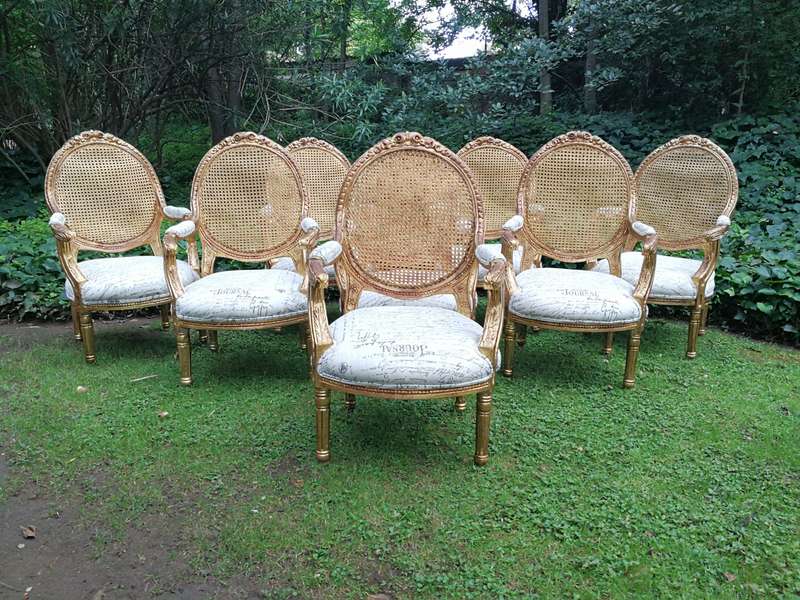 A Pair Of French Style Carved and Gilded Rattan Back Armchairs Upholstered in an Imported Fabric ...