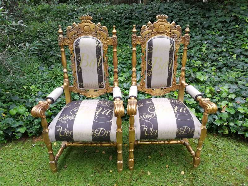 Pair of 19th Century carved teak and gilded in gold leaf open arm throne chairs         ...