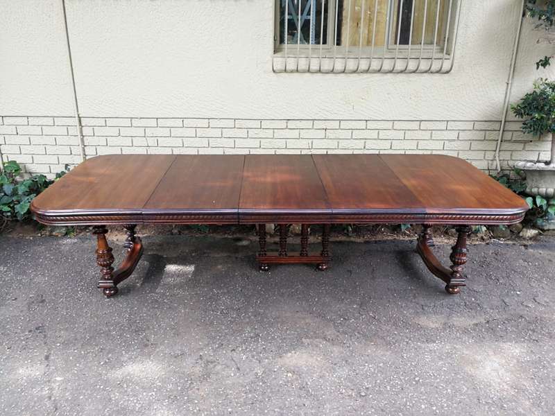 Renaissance Henry II dining table with carved and turned legs and a middle stretcher. Late 19th c...