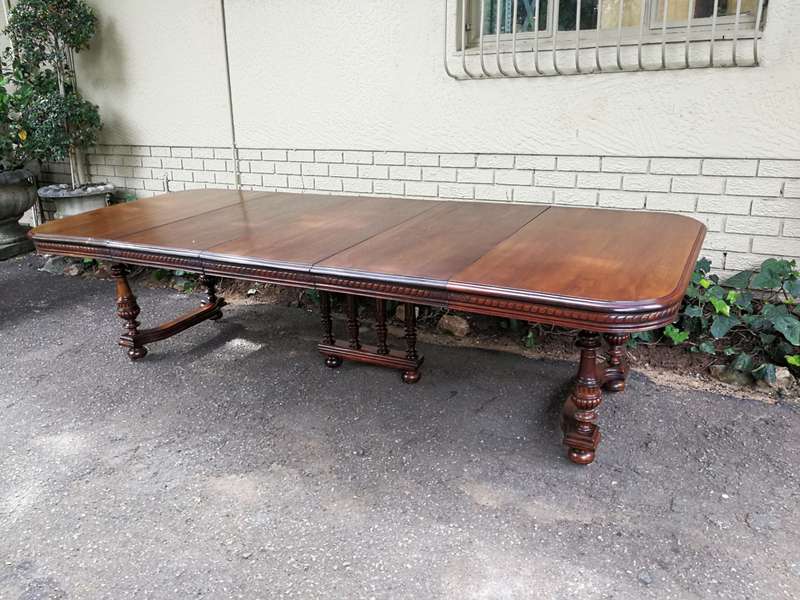 Renaissance Henry II dining table with carved and turned legs and a middle stretcher. Late 19th c...