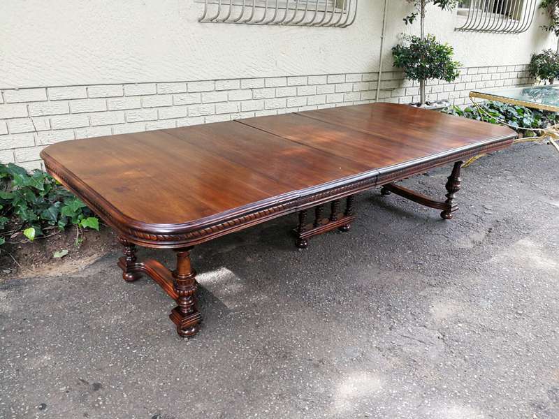 Renaissance Henry II dining table with carved and turned legs and a middle stretcher. Late 19th c...
