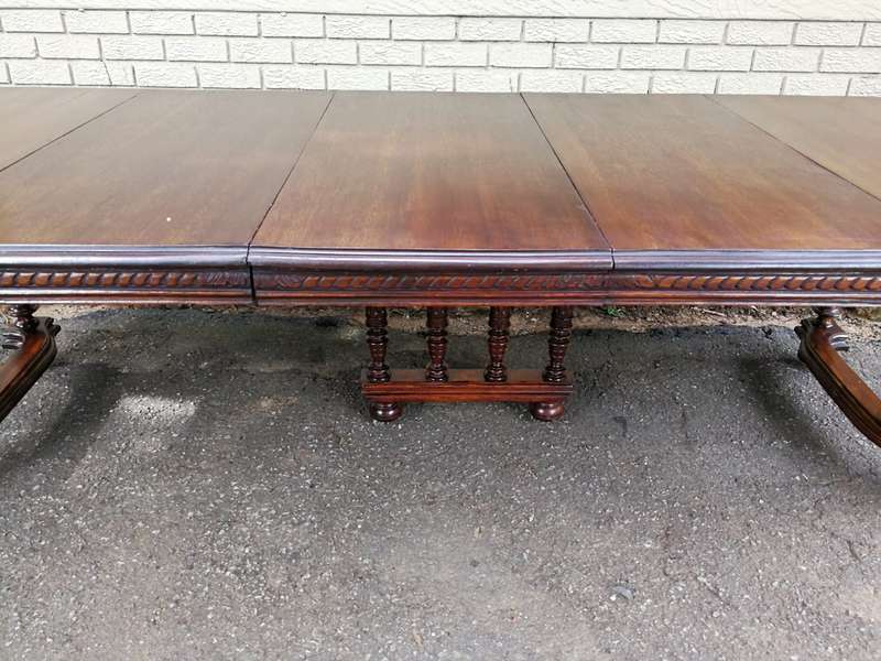 Renaissance Henry II dining table with carved and turned legs and a middle stretcher. Late 19th c...