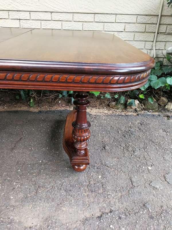 Renaissance Henry II dining table with carved and turned legs and a middle stretcher. Late 19th c...