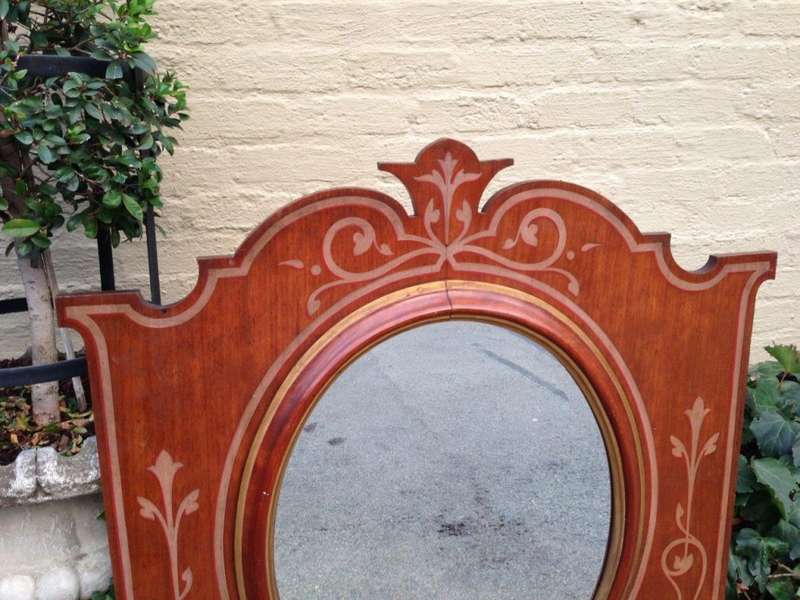 A Pair of Late Victorian Mahogany Framed Mirrors