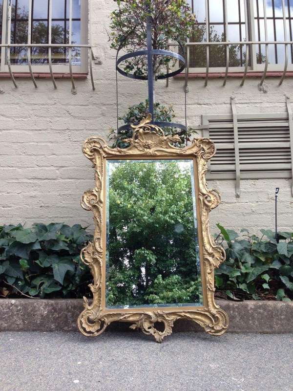 A Gilt Rococo-Style Frame With Bevelled Mirror Plate