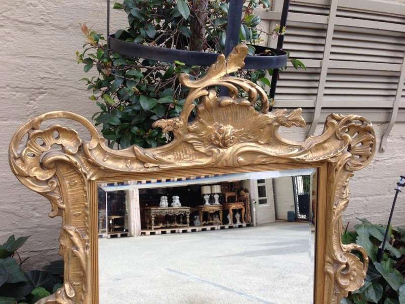 A Gilt Rococo-Style Frame With Bevelled Mirror Plate