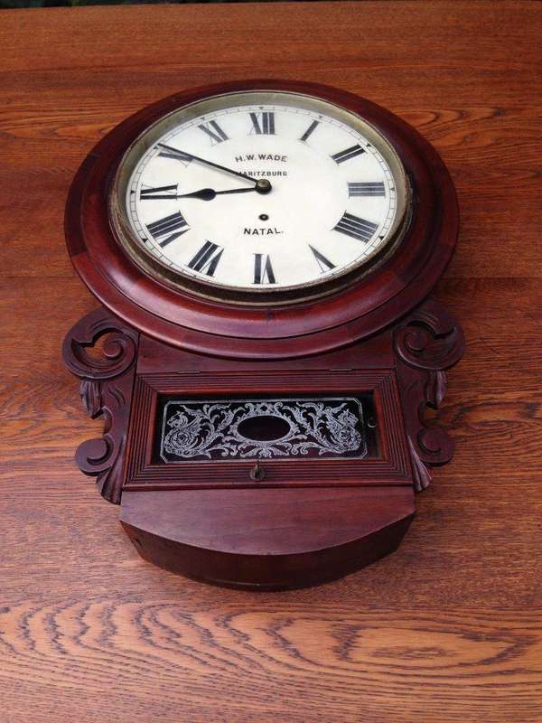 A 19thC mahogany cased Station / Office Wall Clock, with pendulum and key, signed H.W. Wade