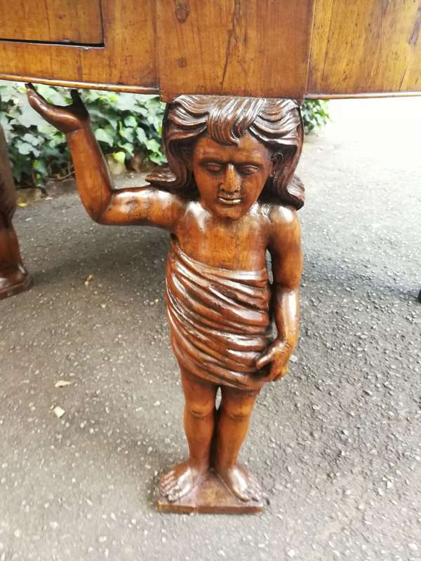 An English Walnut and Rosewood Circular Table With An Inlaid Chess Board And Two Drawers. Circa 1...