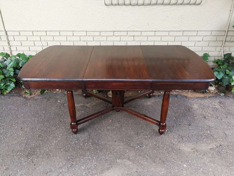 An Edwardian Style Oak 8 Seater Table on an X Stretcher Base