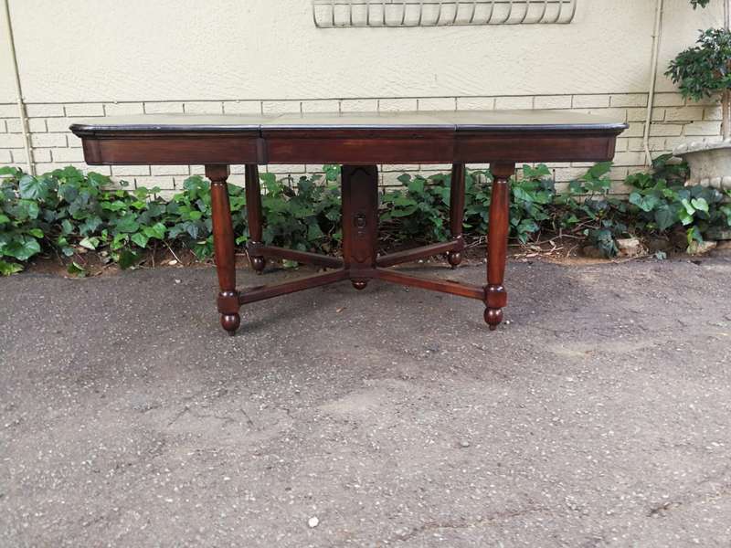 An Edwardian Style Oak 8 Seater Table on an X Stretcher Base
