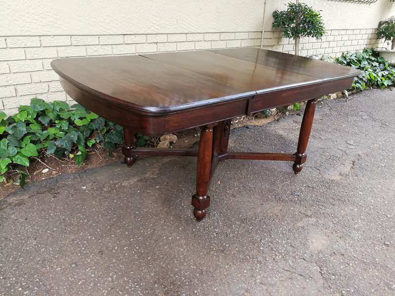An Edwardian Style Oak 8 Seater Table on an X Stretcher Base
